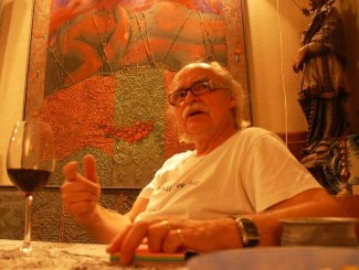 Painter Josef Achrer in art studio